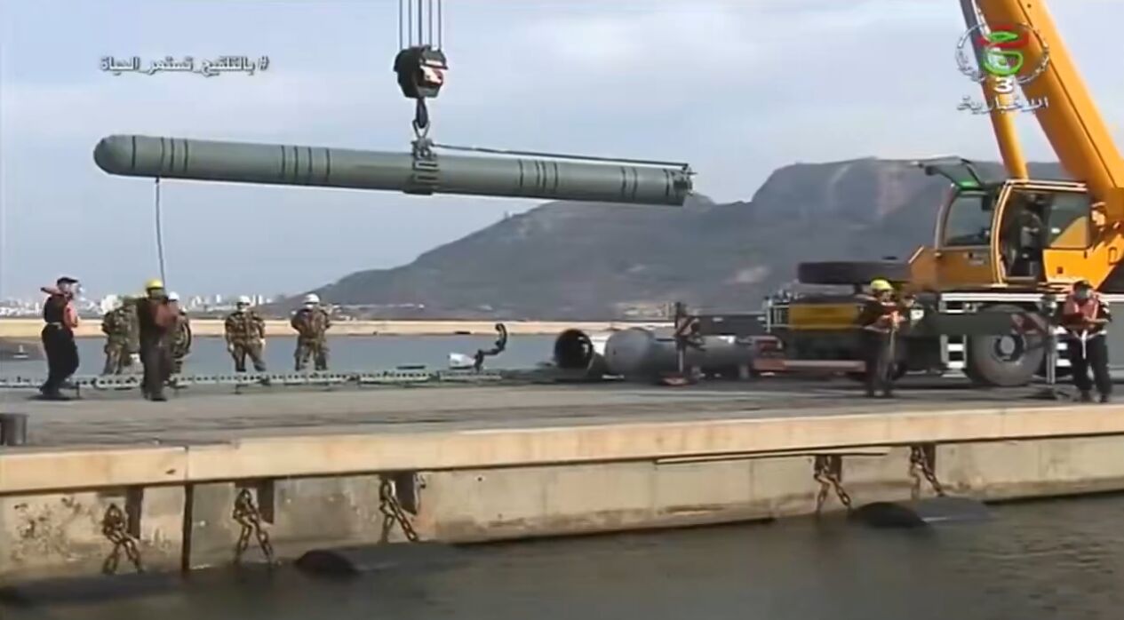 Algerian Navy Personnel Load Munitions Onto Kilo Class Submarine