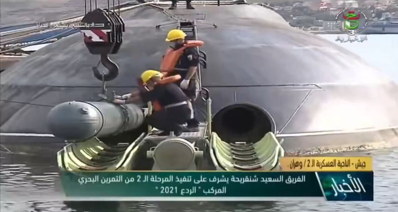 Algerian Navy Personnel Load Munitions Onto Kilo Class Submarine