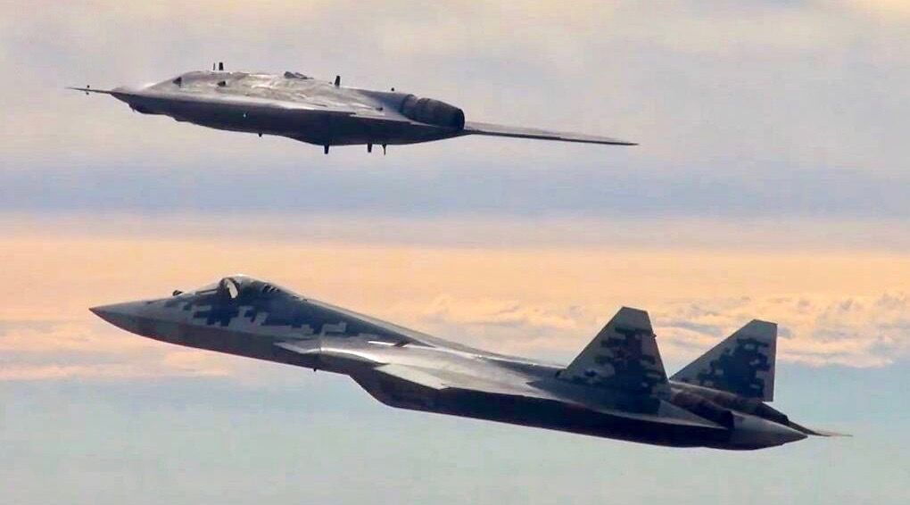 Russian Su-57 Fighter and S-70 Unmanned Fighter Operating Under Similar Manned-Unmanned Teaming Concept