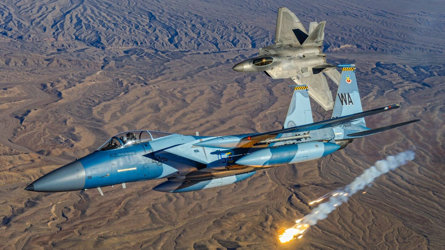 F-15 (front) and F-22 Fighters